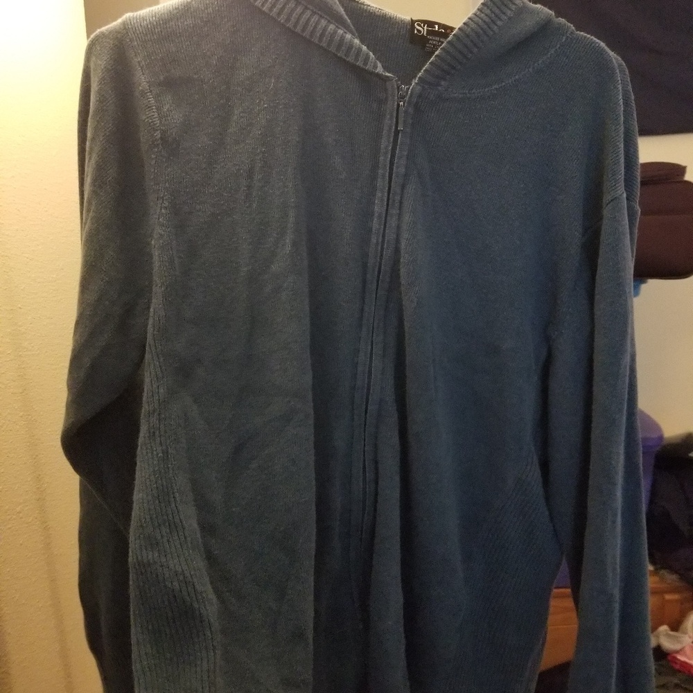 Blue long sleeved zip up sweater